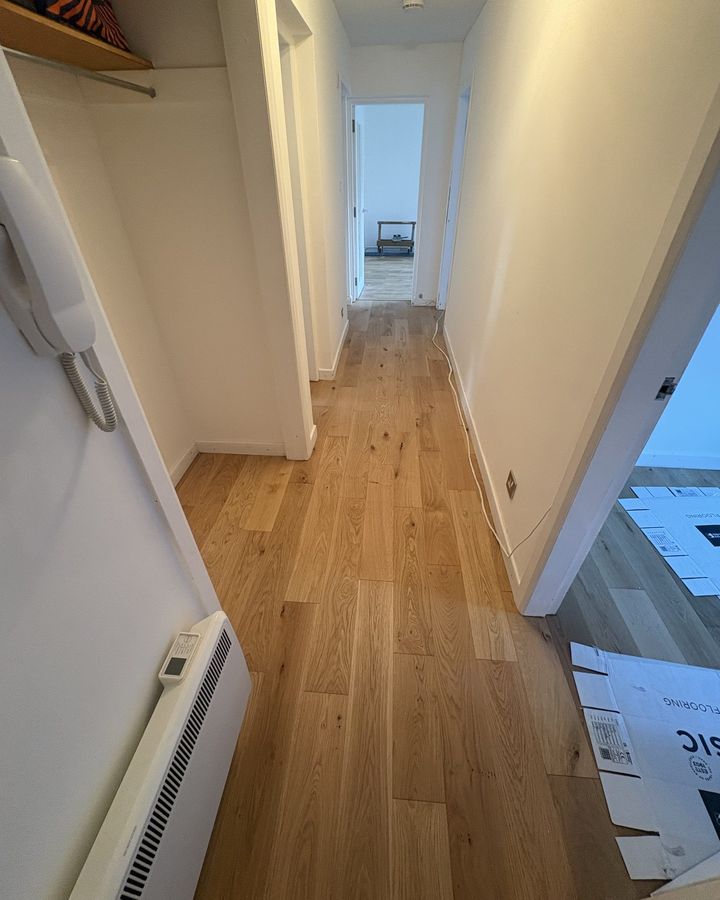 Engineered hardwood boards laid along a hallway in Bridge of Allan